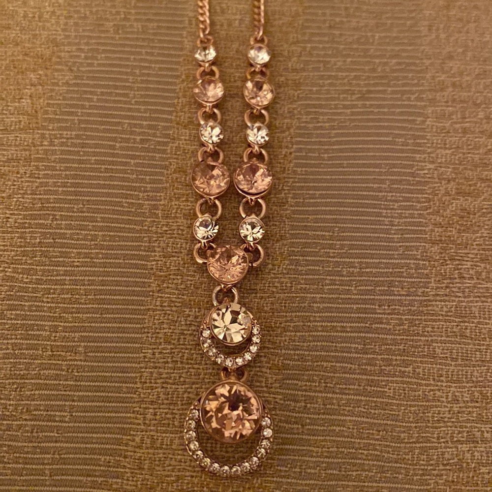 Givenchy rose gold colored necklace w/ gold colored stones. 19”-16” adjustable